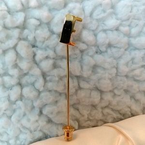 Gold tone stick pin